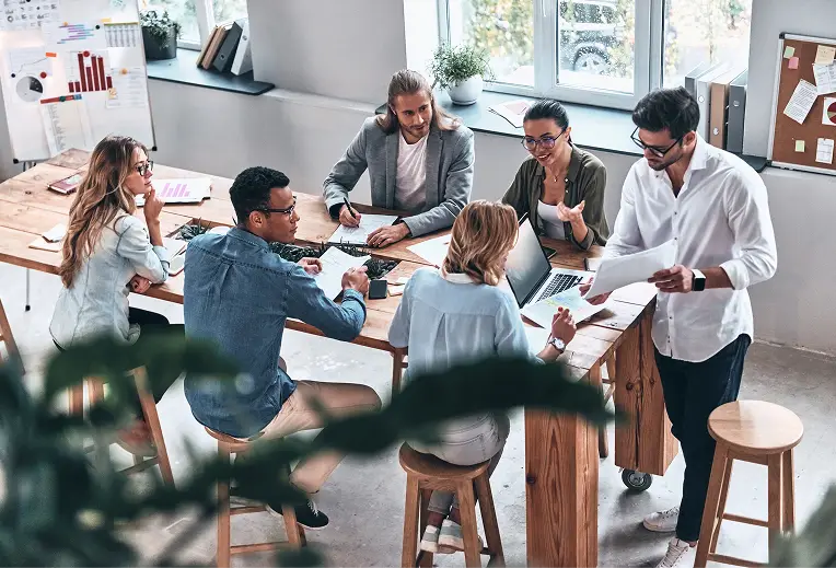 working-as-team-top-view-of-modern-young-people